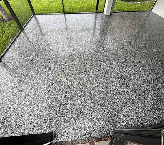 aerial view of homeowner patio with new epoxy flake flooring