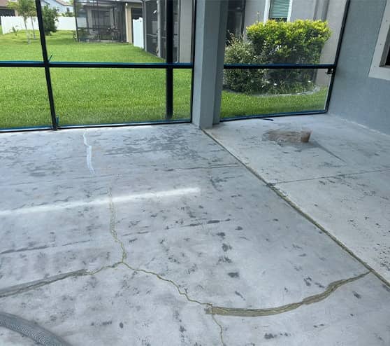 homeowner patio in progress of getting epoxy flake flooring