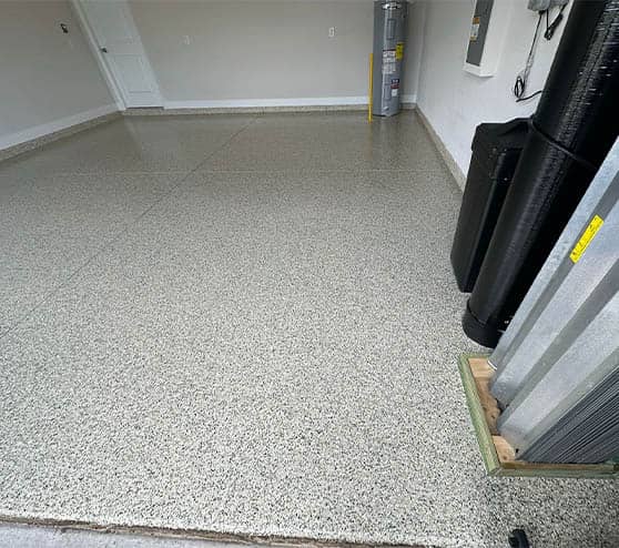 homeowner garage in tampa, fl with freshly poured epoxy flooring
