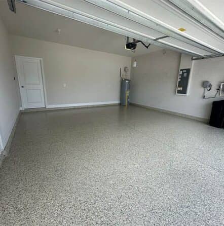 homeowner garage with new hunter flake epoxy flooring