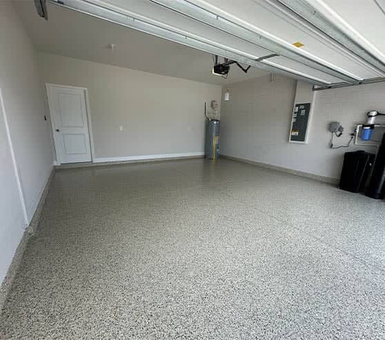homeowner garage with new hunter flake epoxy flooring