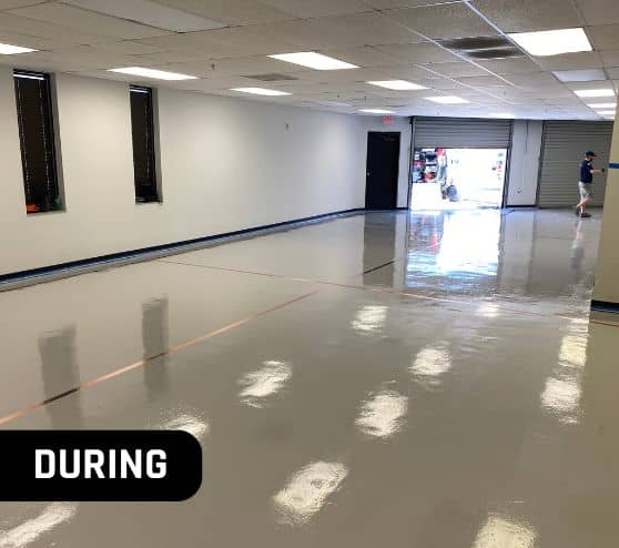 during portrait of solid epoxy flooring getting installed