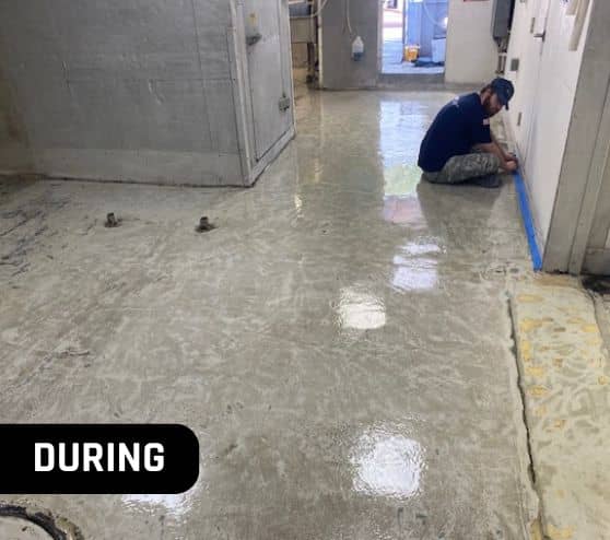 mach one employee installing new flooring