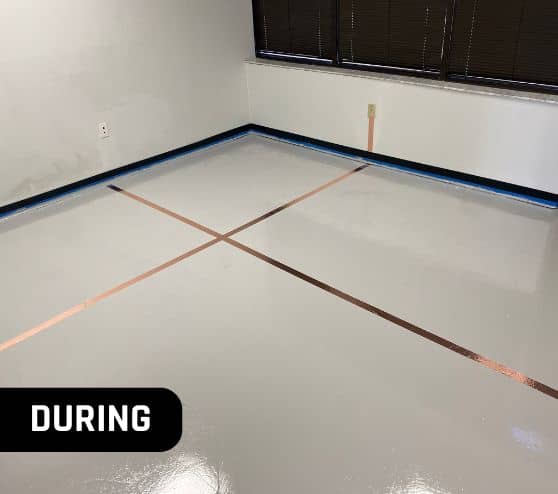 during portrait of VECOM USA flooring all taped up