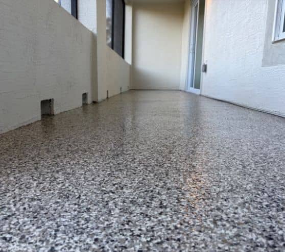 close-up of mushroom epoxy flake flooring for homeowner porch