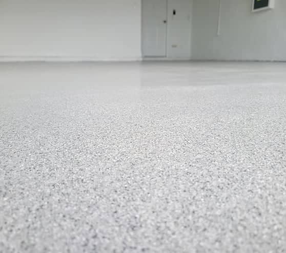 new epoxy flake flooring in a garage