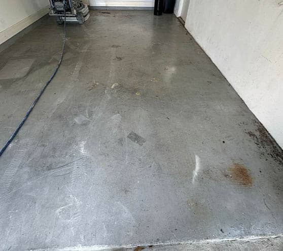 homeowner garage before epoxy flake flooring poured
