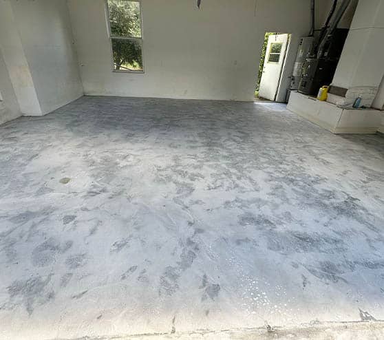 homeowner garage before epoxy flake flooring