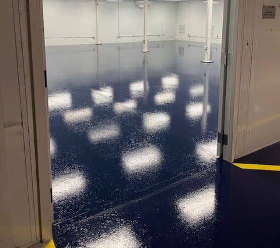 blue solid epoxy installed for TMF Plastics warehouse
