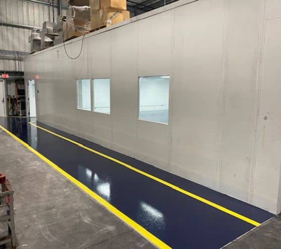 yellow line markings and blue solid epoxy flooring for TMF Plastics