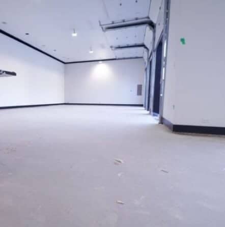 before view of epoxy flake flooring in Decatur, TX