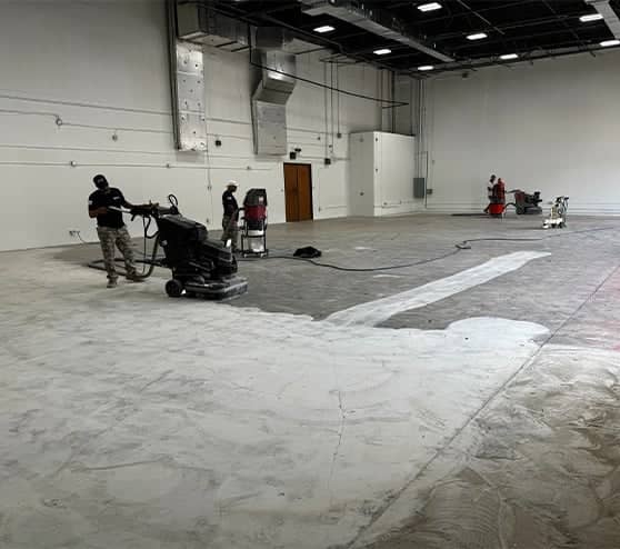 multiple guys repairing concrete