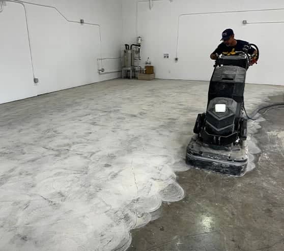 close-up of gentleman using concrete machine