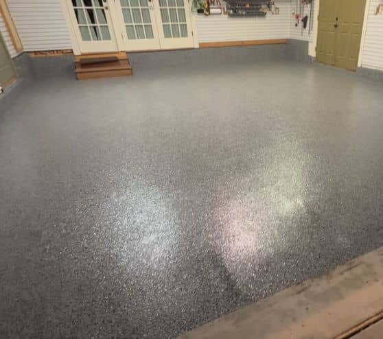 homeowner garage with new epoxy flooring installed