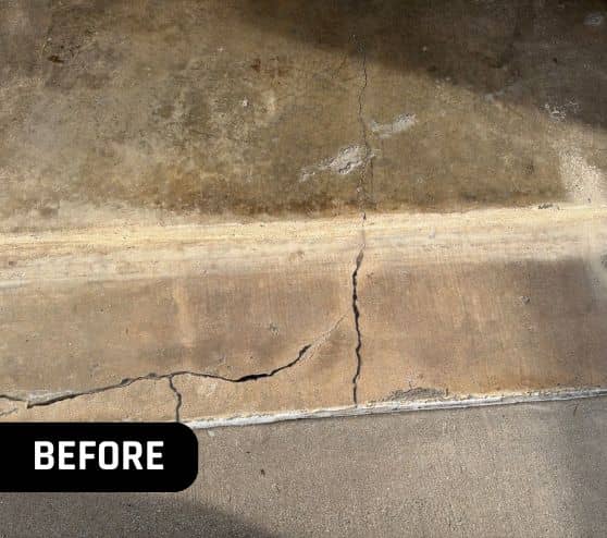 crack in homeowner garage flooring close-up
