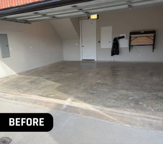 front view of homeowner garage with old concrete flooring before portrait