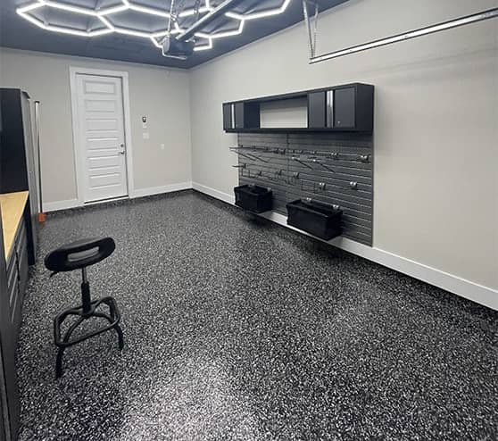 close-up of tool bench in homeowner garage with new flooring