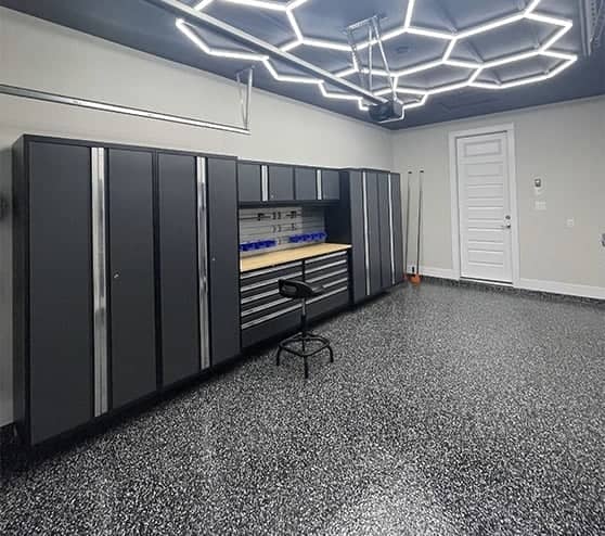 close-up of new epoxy flake flooring for homeowner garage