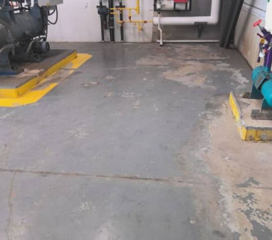 before view of solid epoxy flooring project in San Antonio, TX