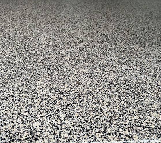 close view of epoxy flake flooring in Helotes, TX