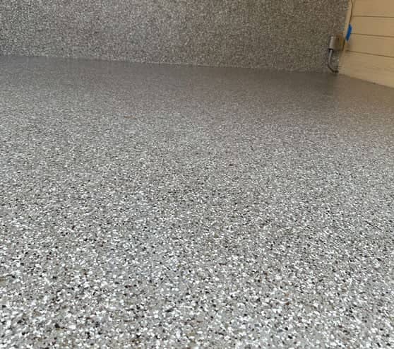 close view of epoxy flake flooring in San Antonio, TX