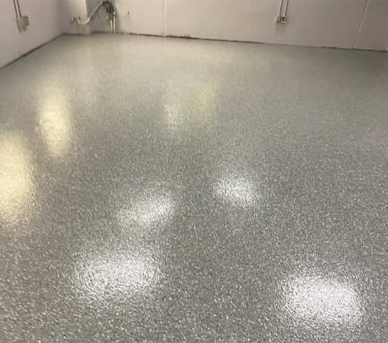 close-up of epoxy flake flooring in allied air