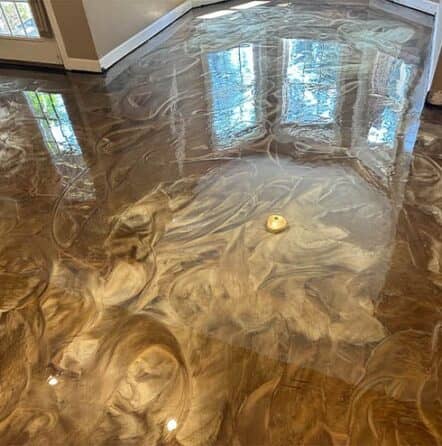 homeowner living room with freshly poured solid epoxy flooring