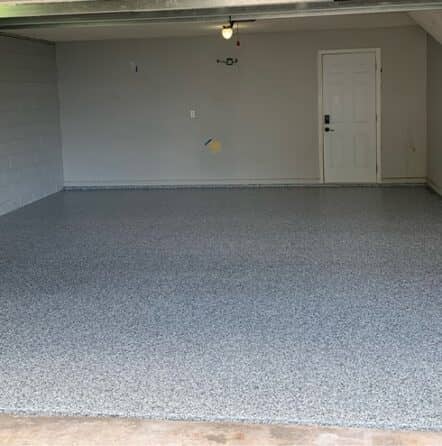 garage after epoxy flake flooring installed