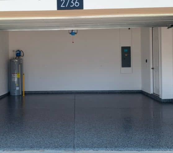 lawrence garage with new epoxy flake flooring installed