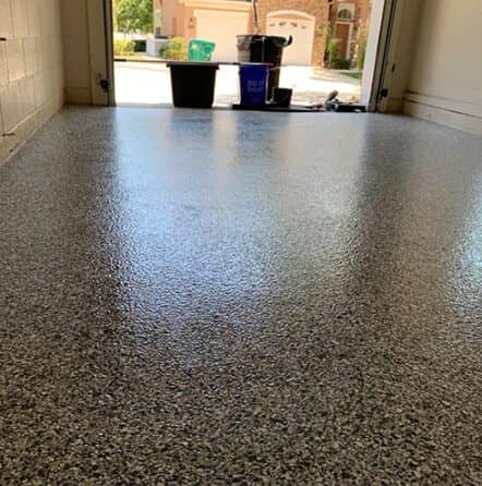 exterior view of garage with flake epoxy flooring