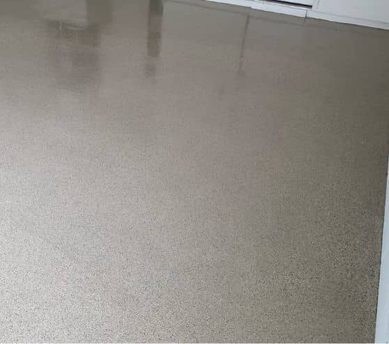 tan epoxy flake flooring installed for Cari garage