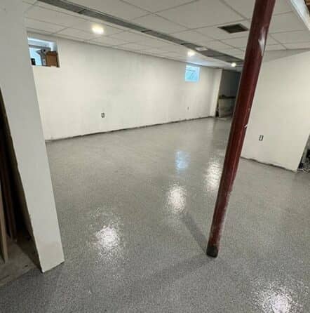 basement with fresh epoxy flake flooring