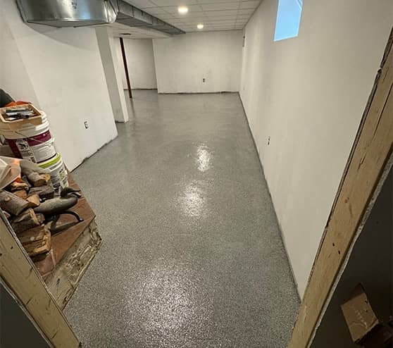 close-up of epoxy flooring inside of basement