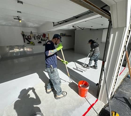 mach one team repairing two car garage flooring