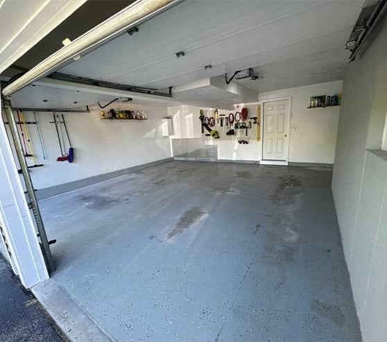 interior view of garage with fresh epoxy flooring