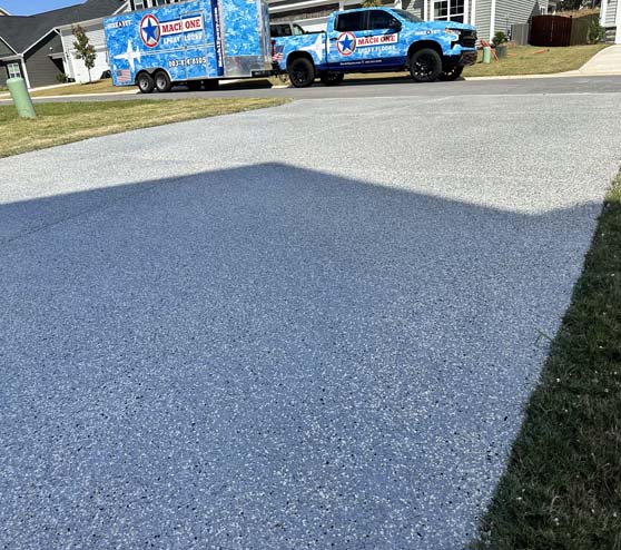 silver epoxy flakes on a driveway