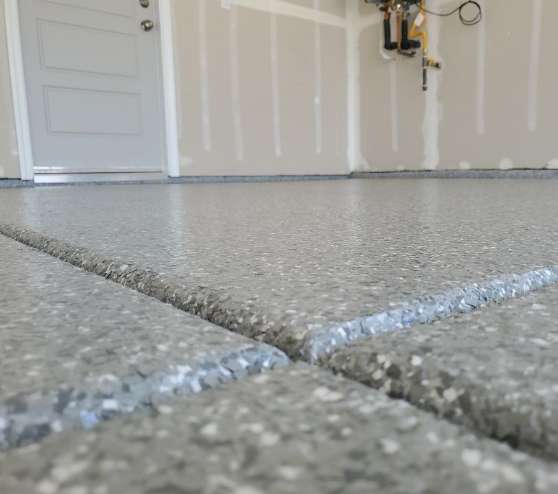 close view of gray epoxy flake floors