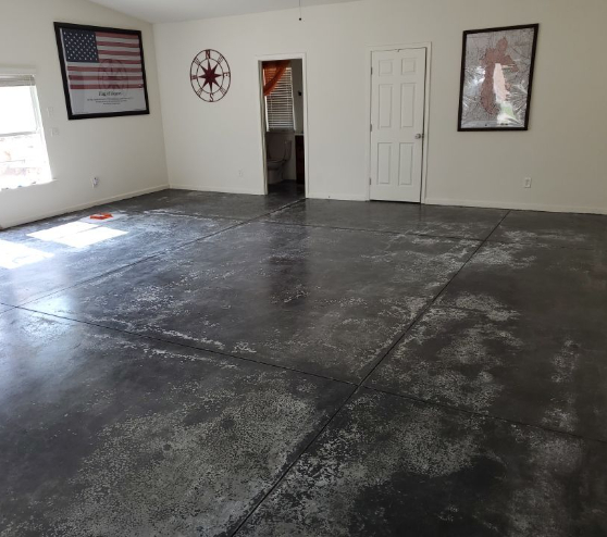 before view of room without epoxy flooring