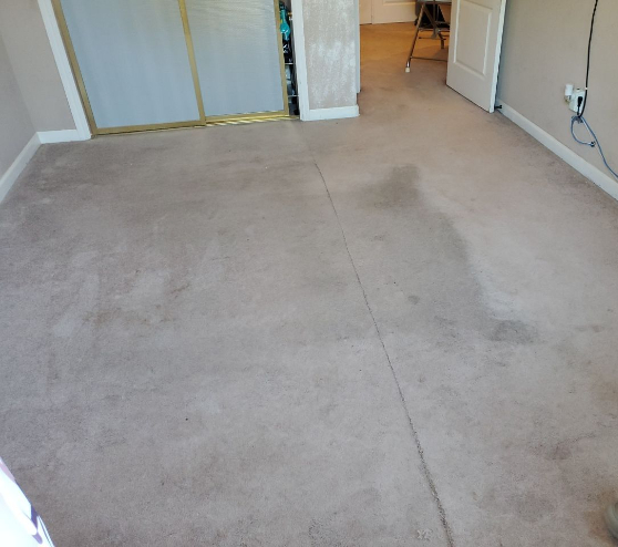 before view of epoxy flake flooring in Madera, CA