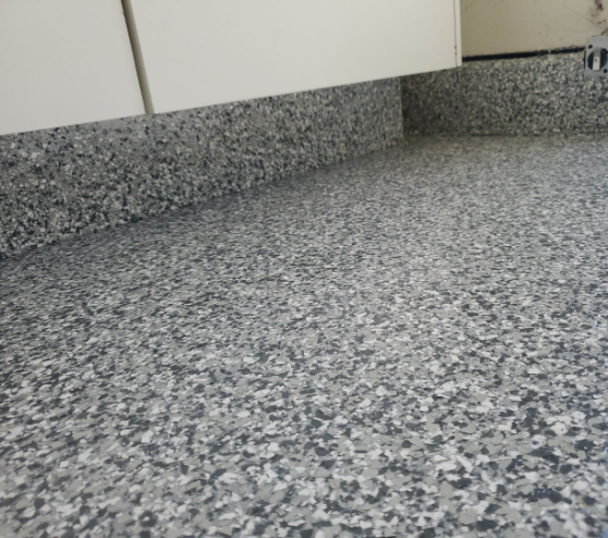 gray epoxy flake flooring in Clovis, CA