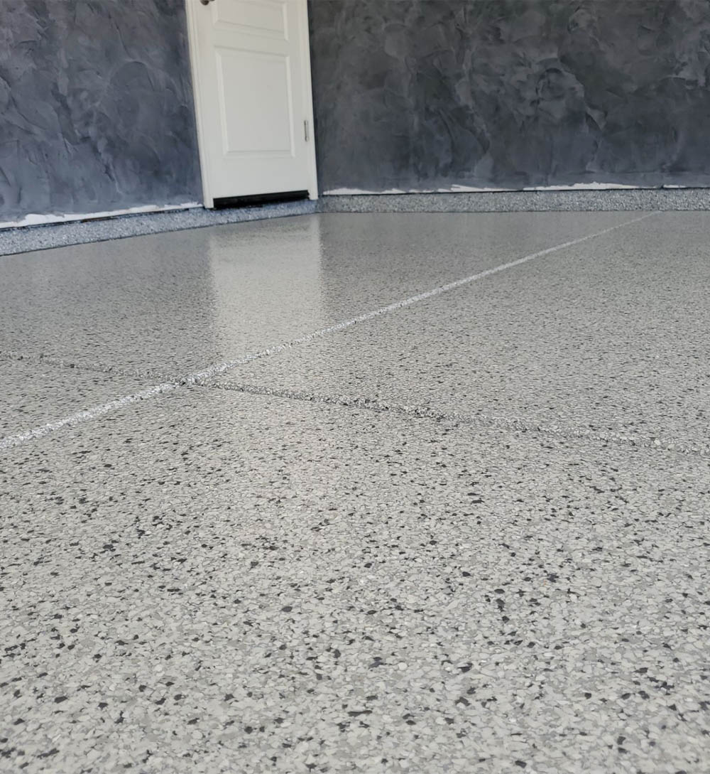 close view of epoxy flake floor in sanger, ca