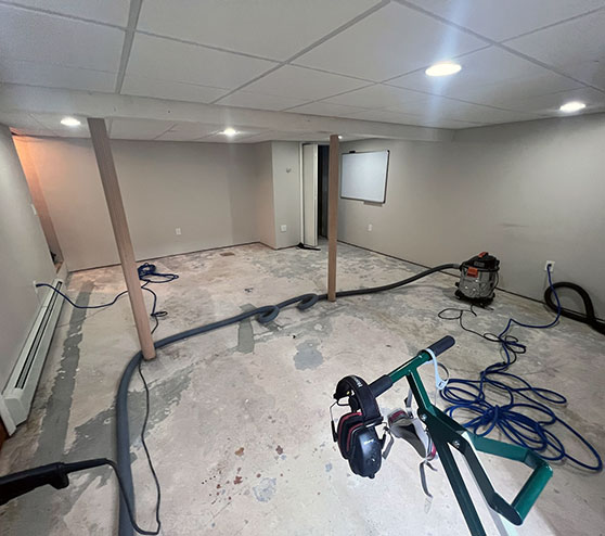 basement being prepped for epoxy coating