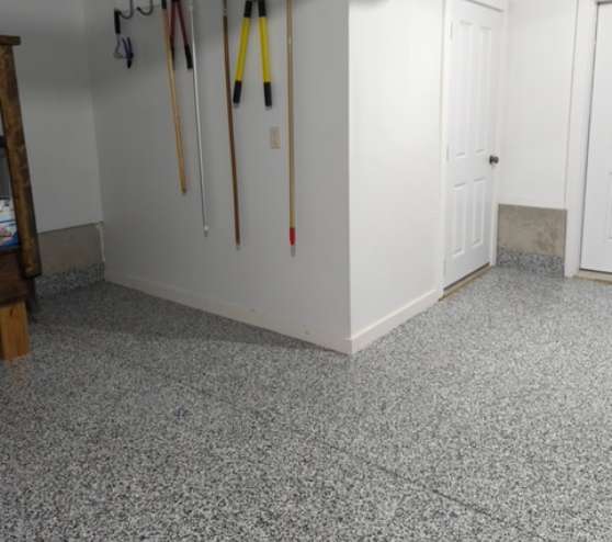 new epoxy floor installation inside garage