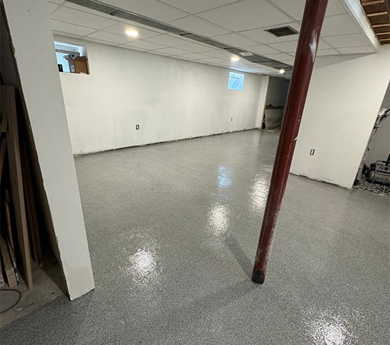 basement with fresh epoxy flake flooring