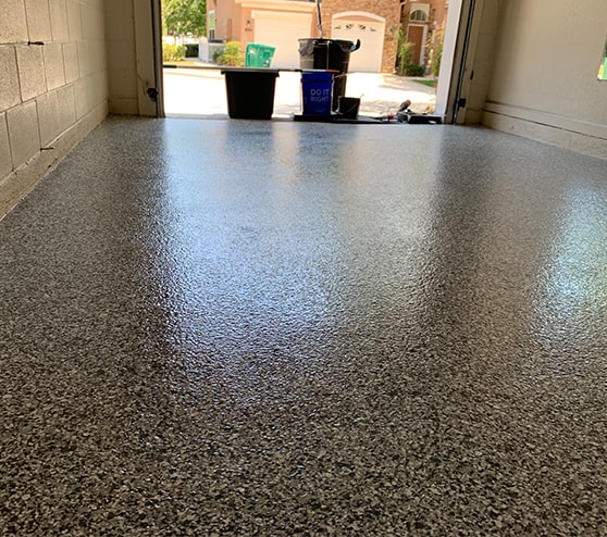 exterior view of garage with flake epoxy flooring