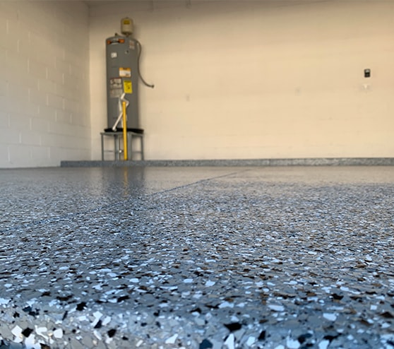epoxy flake flooring in garage for homeowner