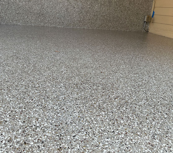 close view of epoxy flake flooring in San Antonio, TX