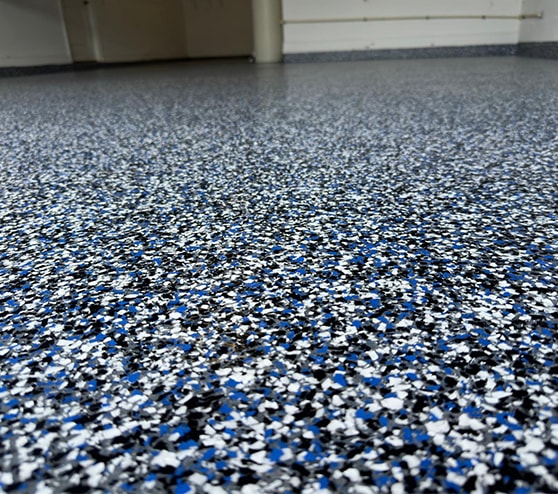 blue epoxy flooring in garage in Riverview