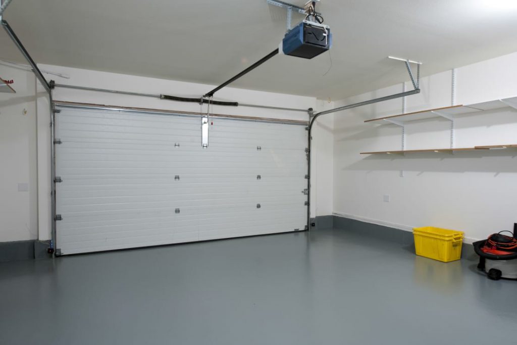 inside of garage with new epoxy flooring