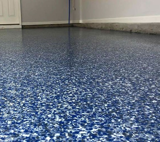 close-up of blue flake epoxy floor in garage